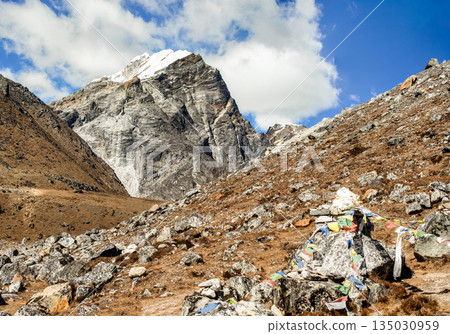 The memorial place on Everest Base Camp trek outside the village of Dughla in Nepal. 135030959