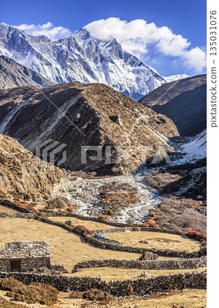 Himalayan mountains landscape on the trail between Pheriche and Namche Bazaar in Nepal. Himalayan mountains landscape on the trail between Pheriche and Namche Bazaar in Nepal. 135031076
