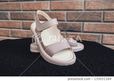Elegant beige leather women sandals blank product for summer fashion branding and premium product showcases. Modern casual design and soft leather texture retail, e-commerce catalogs. No-brand 135031164