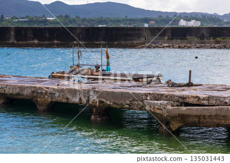 The tranquil scenery of the Kouri Island fishing port off the coast, Madara's old port 135031443