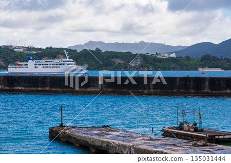 The tranquil scenery of the Kouri Island fishing port off the coast, Madara's old port 135031444