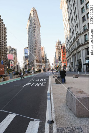Flatiron Building scene is showing flat design with street bike lane fire lane marking, pedestrians Flatiron Building scene is showing flat design with street bike lane fire lane marking, pedestrians 135031522