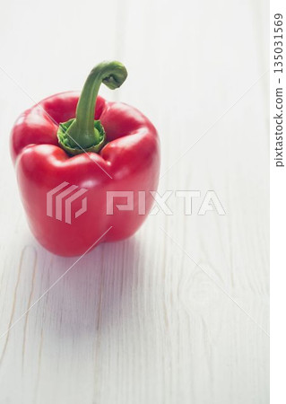 Fresh red pepper on wooden table Fresh red pepper on wooden table 135031569