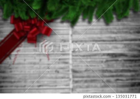 Flat design illustration showing fir branches with glossy red bow resting on weathered grey wood 135031771
