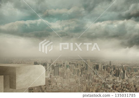 City skyline is being shown in wide high-angle view from concrete ledge under overcast storm clouds 135031785