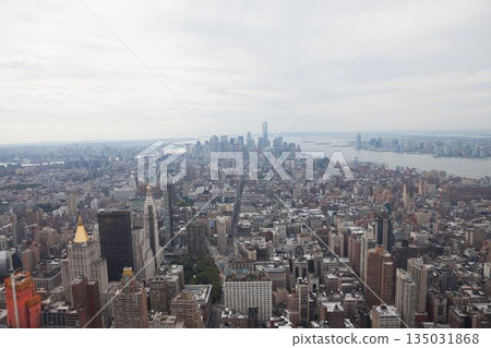 Sprawling city skyline is unfolding in flat design featuring skyscrapers waterfront street grid Sprawling city skyline is unfolding in flat design featuring skyscrapers waterfront street grid 135031868
