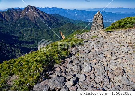 Amida-dake and the Southern and Central Alps as seen from Iodake in the Yatsugatake Mountain Range 135032092