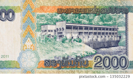 Laos government validated cash banknote 2000 Kip printed for national use in Lao rear view Laos government validated cash banknote 2000 Kip printed for national use in Lao rear view 135032229