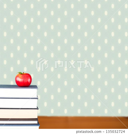 Red apple on pile of books 135032724