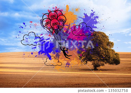Light bulb balloons on splashes over countryside 135032758