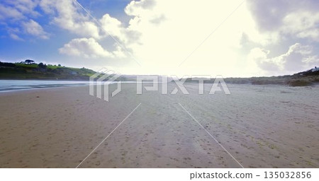 Beach against sky during sunny day Beach against sky during sunny day 135032856