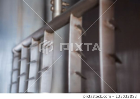 Metal structure against wall in factory 135032858