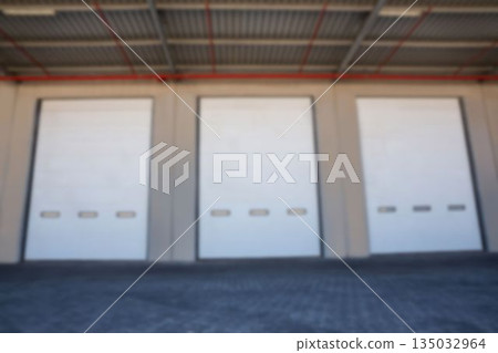 Closed shutters of warehouse Closed shutters of warehouse 135032964