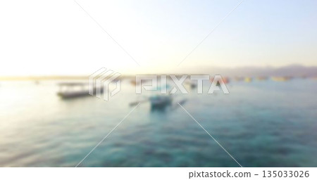 Boats moored on sea against clear sky Boats moored on sea against clear sky 135033026
