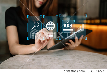 Digital marketing commerce online sale concept, woman using tablet, laptop with Ads and sales. 135033224