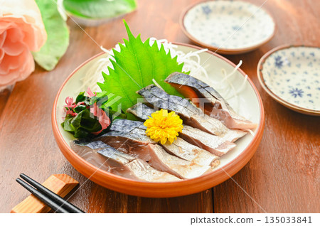 Fresh mackerel sashimi on a plate 135033841