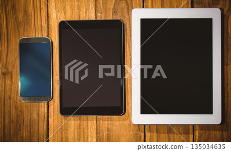 Tablet and smartphone on desk Tablet and smartphone on desk 135034635