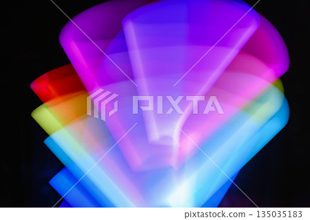 Abstract image of light painting with blur effect. Colorful vibrant lights are swirling in the dark background. It can be used as wallpaper, background or design element 135035183