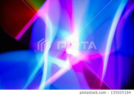 Abstract image of light painting with blur effect. Colorful vibrant lights are swirling in the dark background. It can be used as wallpaper, background or design element 135035184