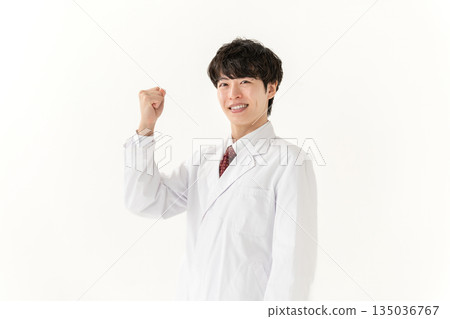 Medical Young doctor fist pump Medical Young doctor fist pump 135036767