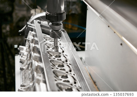 Engine valve car maintenance.The cylinder block of the six-cylinder engine. Disassembled motor vehicle for repair. Engine valve car maintenance.The cylinder block of the six-cylinder engine. Disassembled motor vehicle for repair. 135037693