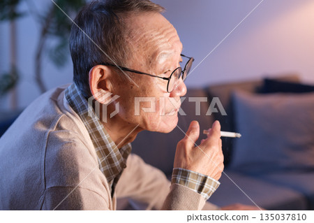 Senior men smoking cigarettes Senior men smoking cigarettes 135037810