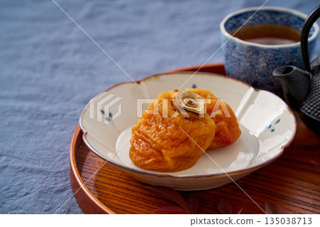 Dried persimmon tea cake and Japanese tea 135038713