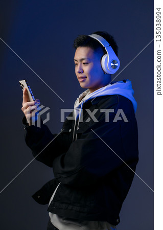 Male, teenage, casual, headphones Male, teenage, casual, headphones 135038994