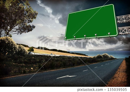 Blank green highway sign is hanging from metal truss above rural coastal road in flat design 135039505