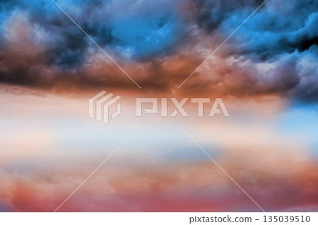 Blue orange cloudy sky background Blue orange cloudy sky background 135039510