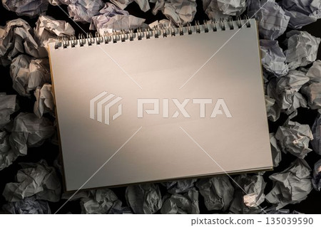 Paper notebook on crumpled paper 135039590