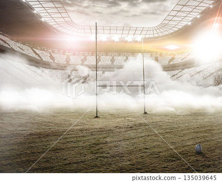 Flat design showing foggy rugby stadium with grass field, goalposts, rugby ball, floodlights 135039645