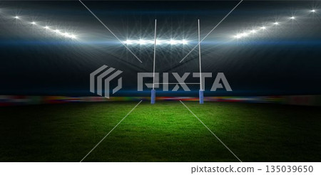 Flat design graphic is showing rugby goal post under floodlights on green turf with blurred banners Flat design graphic is showing rugby goal post under floodlights on green turf with blurred banners 135039650