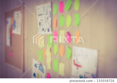 Adhesive notes on wooden wall 135039728