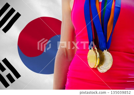 Midsection of medalist against South Korean flag Midsection of medalist against South Korean flag 135039852