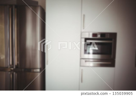 Refrigerator in kitchen at home Refrigerator in kitchen at home 135039905