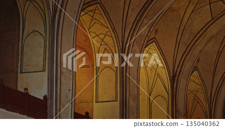 Red Fort corridor with illuminated Mughal arches and warm yellow light at night in Delhi Red Fort corridor with illuminated Mughal arches and warm yellow light at night in Delhi 135040362