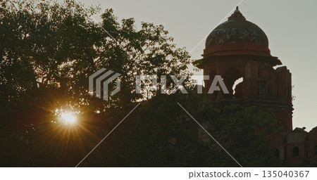 Red sandstone arches of Red Fort with intricate stone details and architectural ornamentation 135040367