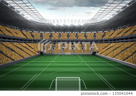 Vast football stadium with fans in yellow 135041044