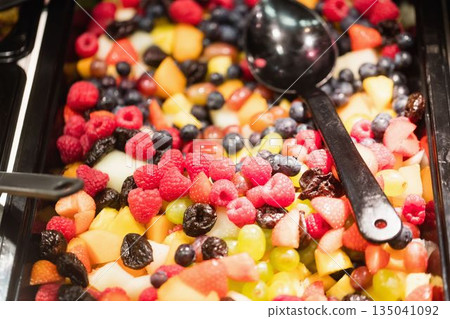 Close-up of fruit salad in container Close-up of fruit salad in container 135041092
