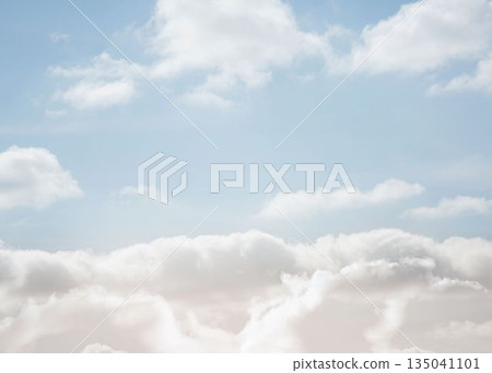 Panoramic flat design featuring fluffy cumulus and wispy clouds drifting under pale blue sky Panoramic flat design featuring fluffy cumulus and wispy clouds drifting under pale blue sky 135041101
