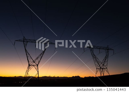 The evening electricity pylon silhouette The evening electricity pylon silhouette 135041443