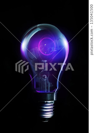 Vector design is showing light bulb hanging in backdrop with glowing filament and purple-blue ring Vector design is showing light bulb hanging in backdrop with glowing filament and purple-blue ring 135041500
