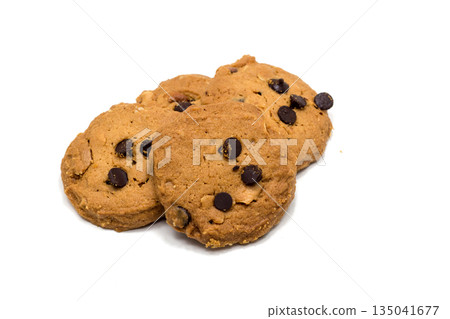Delicious homemade chocolate chip cookies, perfectly golden brown and rich with melty chocolate, artfully arranged on a clean white background, ideal for tempting advertisements 135041677
