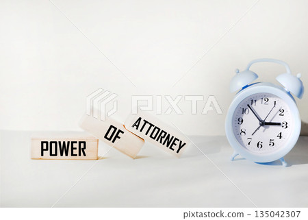 Wooden blocks with the inscription Power of Attorney on a white background 135042307