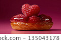 A glossy pastry topped with fresh raspberries presented in a vibrant minimal food composition 135043178