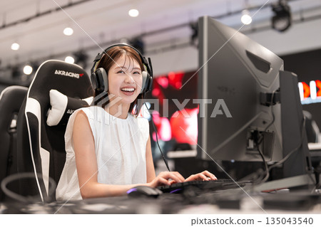 Young woman enjoying e-sports games Young woman enjoying e-sports games 135043540