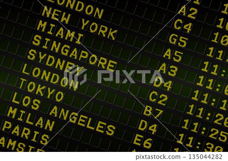 Black airport departures board with yellow text Black airport departures board with yellow text 135044282