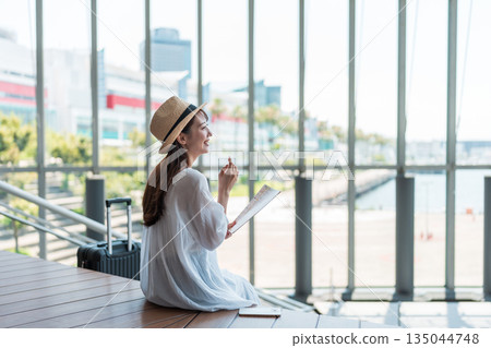 Young woman traveling Young woman traveling 135044748