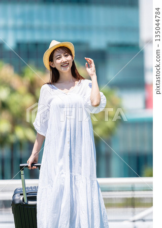 Young woman going on a trip Young woman going on a trip 135044784